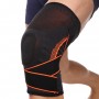 Наколінник-бандаж Knee Brace з силіконовим кільцем, ременем та спіральними ребрами жорсткості (718CA) Наколінник-бандаж Knee Brace з силіконовим кільцем, ременем та спіральними ребрами жорсткості (718CA)